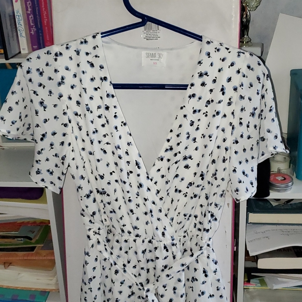 White dress with blue flowers